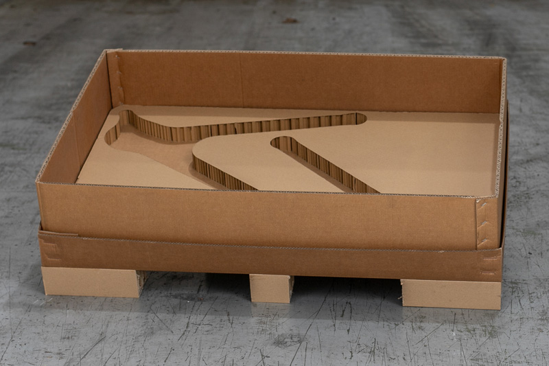 caja con acondicionador de cartón